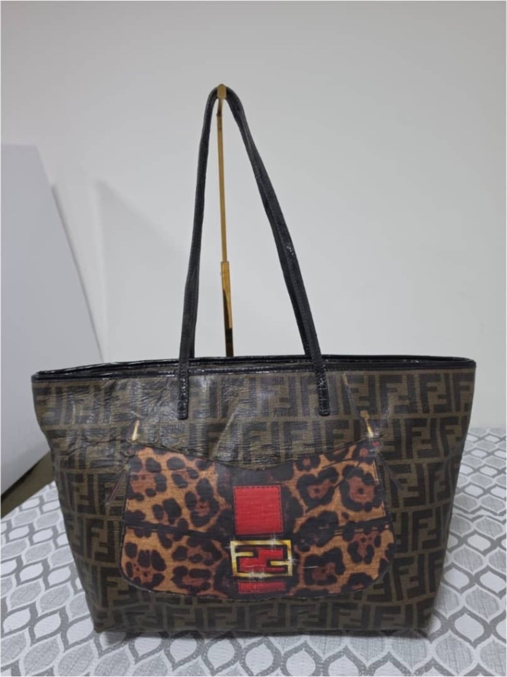 Authentic Fendi Zucca Coated Canvas and Wrinkled Leather Baguette Print Roll Sho
